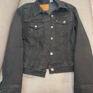 Levi’s black jean jacket.